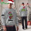 Personalized Las Vegas Raiders NFL Team Color Grinch Ugly Christmas Sweater