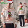 Personalized Cleveland Browns Nfl Grinch Santa Hats Ugly Christmas Sweater 2 Cleveland Browns Nfl Grinch Santa Hats Ugly Christmas Sweater