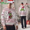 Personalized Tampa Bay Buccaneers Nfl Grinch Santa Hats Ugly Christmas Sweater 1 Tampa Bay Buccaneers Nfl Grinch Santa Hats Ugly Christmas Sweater