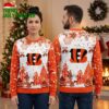 Cincinnati Bengals Logo With Snowflakes And Winter Trees Ugly Christmas Sweater 1 cincinnati bengals logo with snowflakes and winter trees ugly christmas sweater