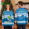 Detroit Lions Grinch Holding Football Ugly Christmas Sweater 2 detroit lions grinch holding football ugly christmas sweater