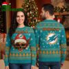 Miami Dolphins Golden Skull Santa Hat Ugly Christmas Sweater 1 miami dolphins golden skull santa hat ugly christmas sweater