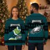 Philadelphia Eagles Grinch Holding Football Ugly Christmas Sweater 2 philadelphia eagles grinch holding football ugly christmas sweater