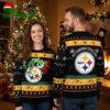 pittsburgh steelers grinch holding christmas lights ugly christmas sweater