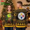 Pittsburgh Steelers Grinch Holding Football Ugly Christmas Sweater 1 pittsburgh steelers grinch holding football ugly christmas sweater