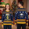 buffalo sabres grinch in santa hat ugly christmas sweater