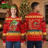 Calgary Flames Grinch Wrapped In Christmas Lights Ugly Christmas Sweater 1 calgary flames grinch wrapped in christmas lights ugly christmas sweater
