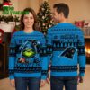 Carolina Panthers Grinch Holding Football Ugly Christmas Sweater 2 carolina panthers grinch holding football ugly christmas sweater