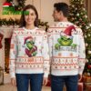 Cleveland Browns Grinch Santa Hat Football Ugly Christmas Sweater 1 cleveland browns grinch santa hat football ugly christmas sweater