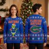 Florida Gators Grinch Holding Football Ugly Christmas Sweater 1 florida gators grinch holding football ugly christmas sweater