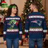 New England Patriots Grinch Hand Football Ugly Christmas Sweater 1 new england patriots grinch hand football ugly christmas sweater