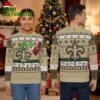 new orleans saints grinch hand holding football ugly christmas sweater