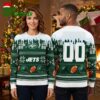 New York Jets Football Helmet And Football Pattern Ugly Christmas Sweater 1 new york jets football helmet and football pattern ugly christmas sweater