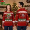 san francisco 49ers grinch hand holding football ugly christmas sweater