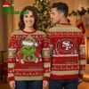 San Francisco 49ers Grinch Santa Hat Ugly Christmas Sweater 1 san francisco 49ers grinch santa hat ugly christmas sweater