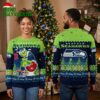 Seattle Seahawks Grinch Holding Football Helmets Ugly Christmas Sweater 1 seattle seahawks grinch holding football helmets ugly christmas sweater