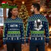 Seattle Seahawks Skull And Football Snowflake Ugly Christmas Sweater 1 seattle seahawks skull and football snowflake ugly christmas sweater
