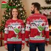 Washington Capitals Grinch Holding Hockey Puck Ugly Christmas Sweater 1 washington capitals grinch holding hockey puck ugly christmas sweater